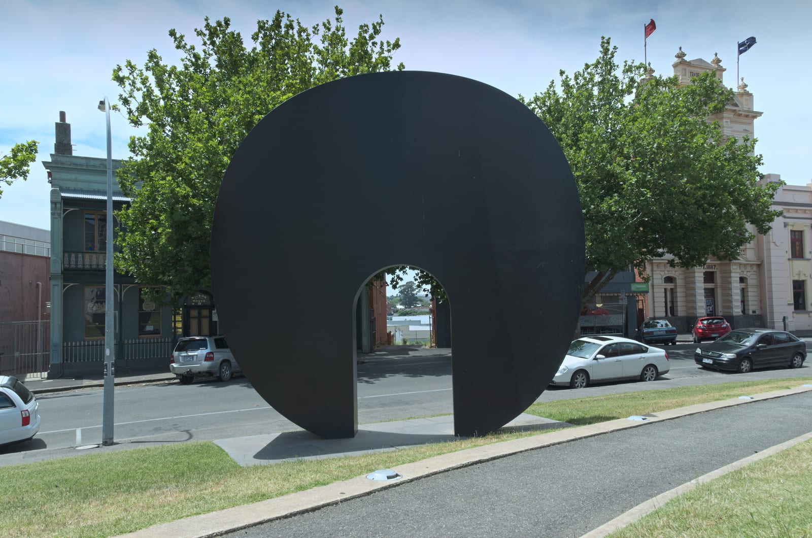 A five-metre by five-metre Steel Sculpture  by Inge King "Grand Arch" Placed as the centrepiece of the Alfred Deakin Place - part of a redevelopment in conjunction with the State Government, City of Ballarat, University of Ballarat, Ballarat Fine Art Gallery and the Federal Government.