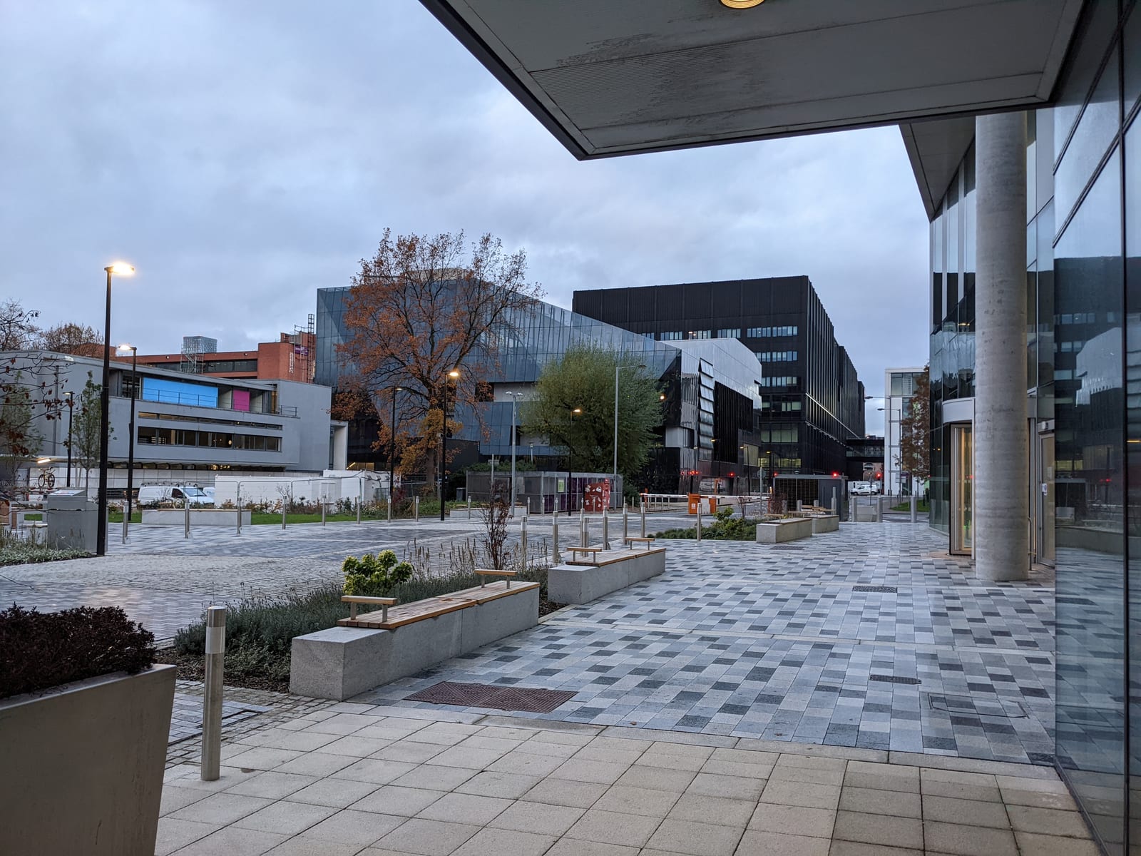 Various buildings at the University of Manchester. The building next to the photographer is the Alan Turing Building.